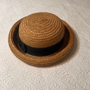 Straw hat with black ribbon accent